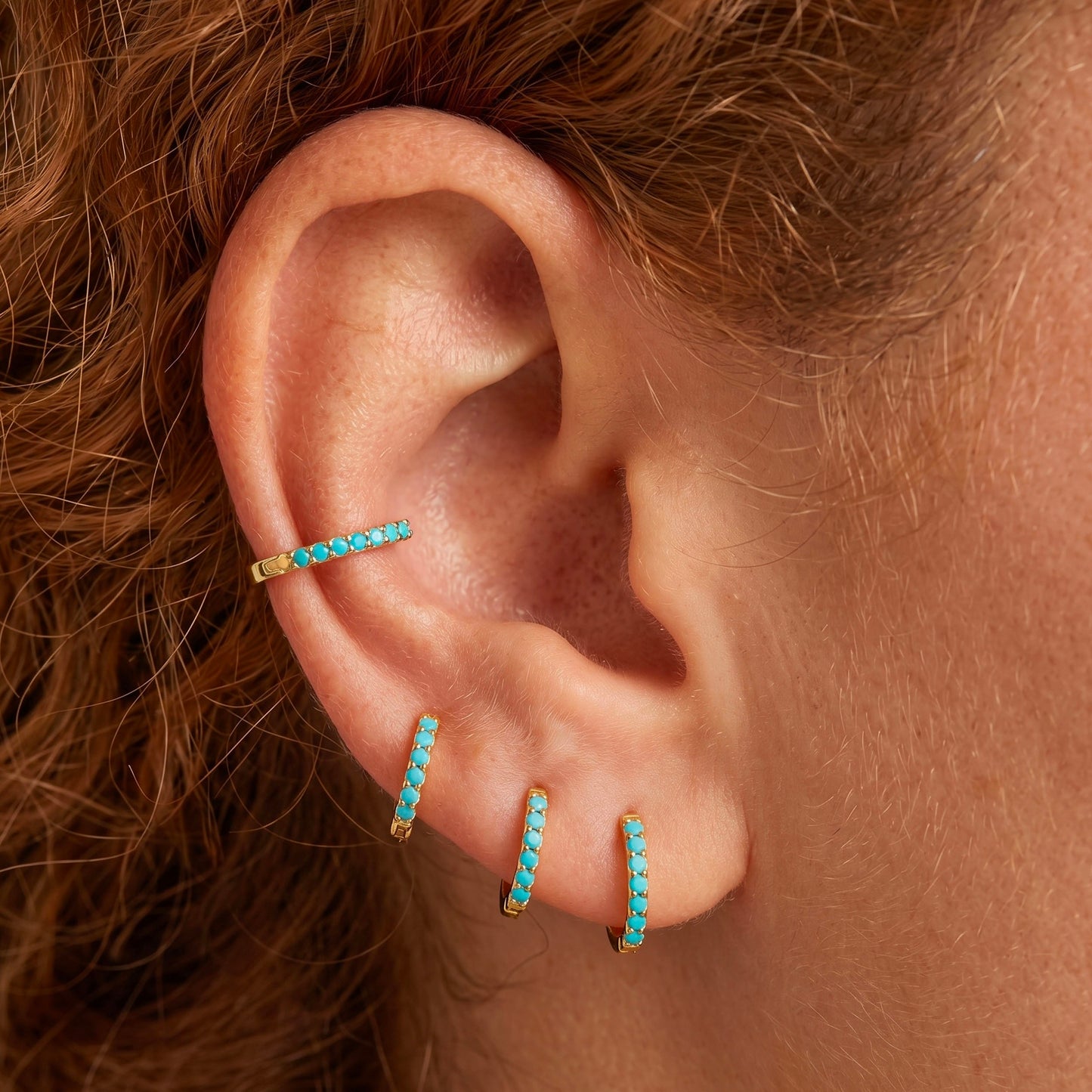 Turquoise huggie hoop